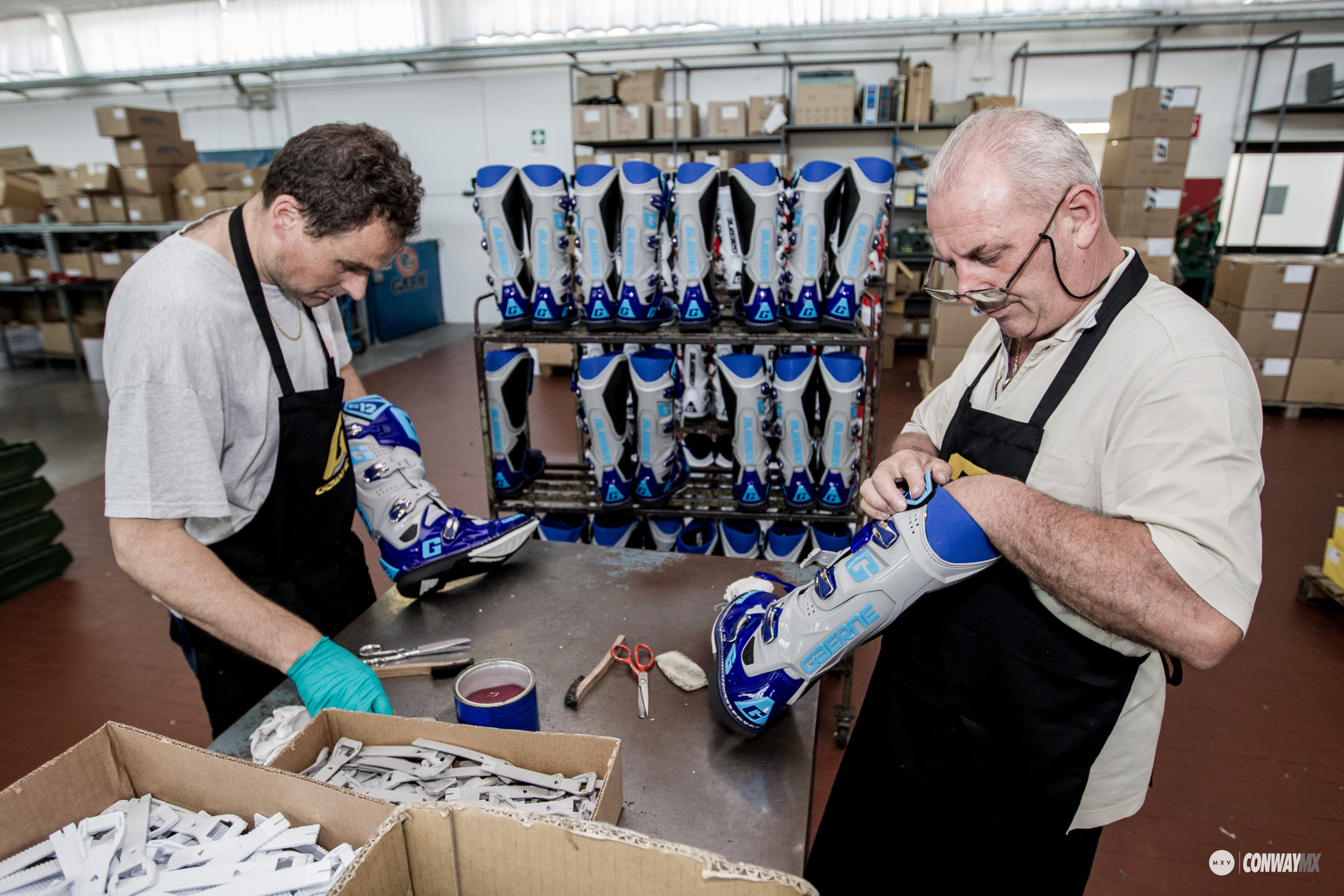 At this point the boots are thoroughly cleaned and inspected before the final boot straps are fitted.